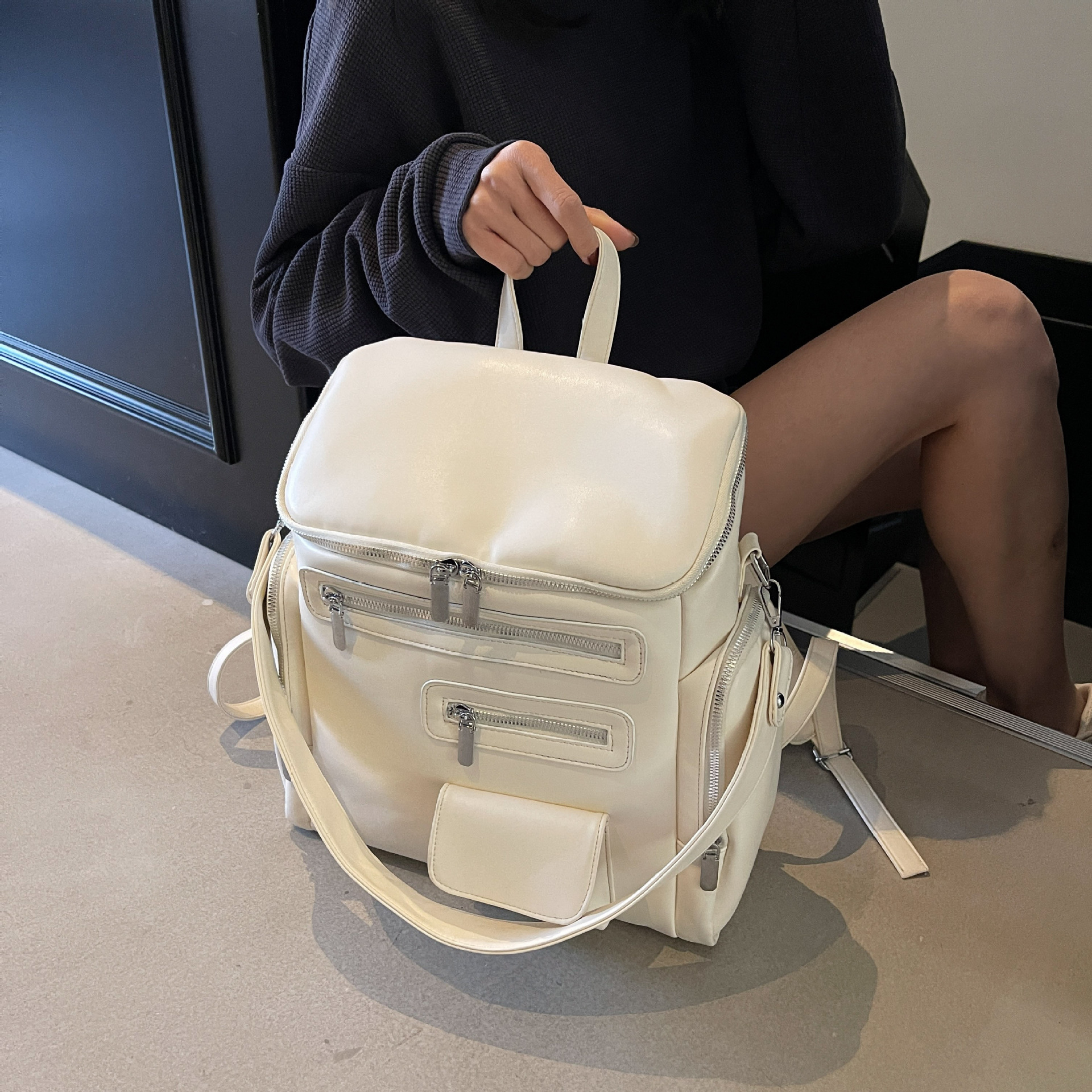 Fashionable large capacity backpack niche simple design shoulder bag texture motorcycle college backpack